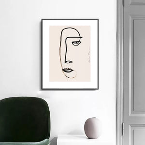 Canvas print light pink back ground line drawing of a female face